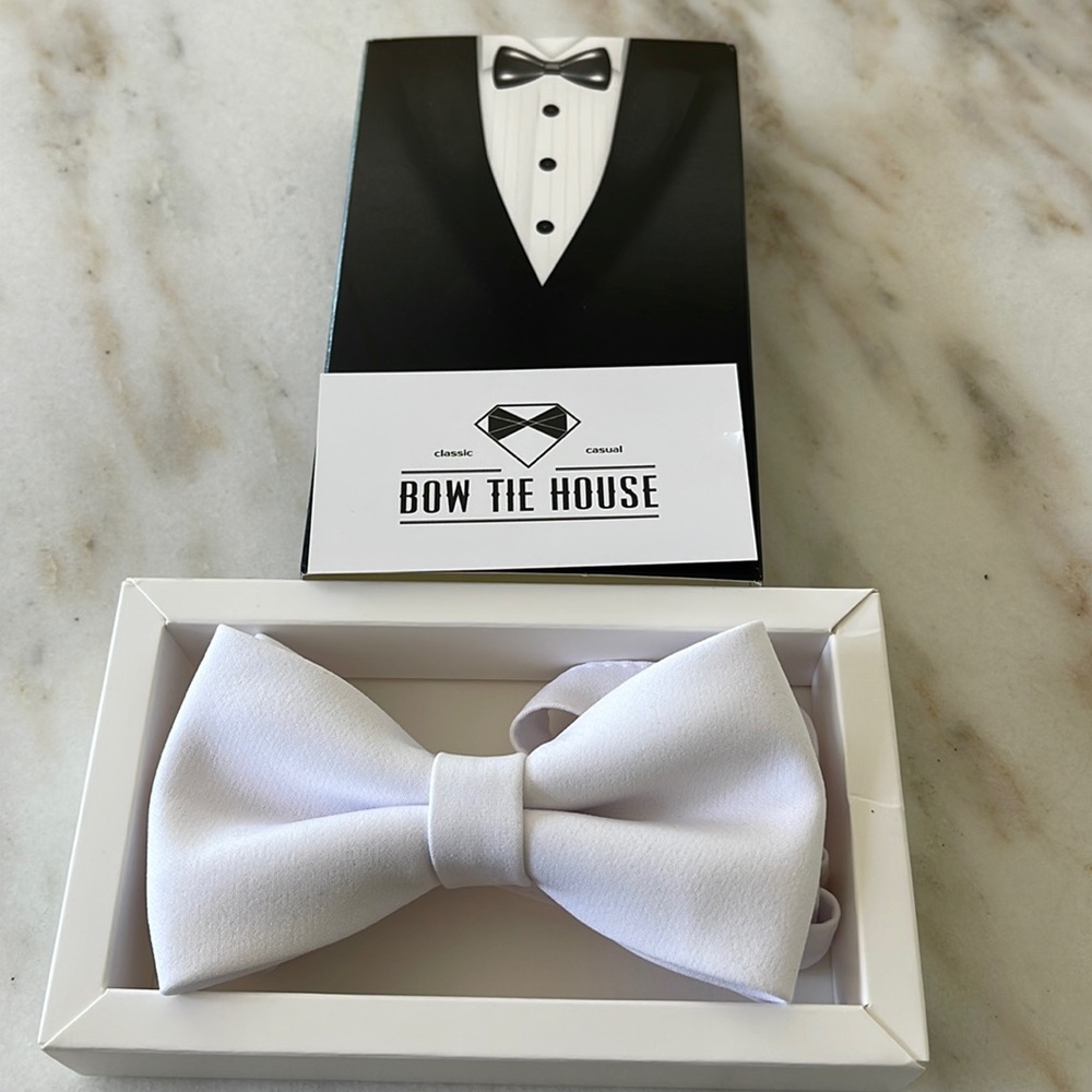 White bow tie from Bow Tie House. Size large which is for adults. BRAND NEW